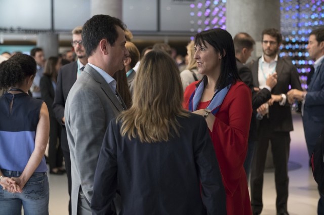 PHOTO 4: Our CEO Elena Gil, conversing with the attendees during the cocktail